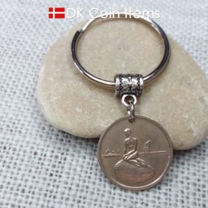 Denmark Little Mermaid coin keychain with Copenhagen Little Mermaid fare token.