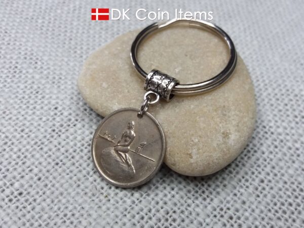 Denmark Little Mermaid coin keychain with Copenhagen Little Mermaid fare token.