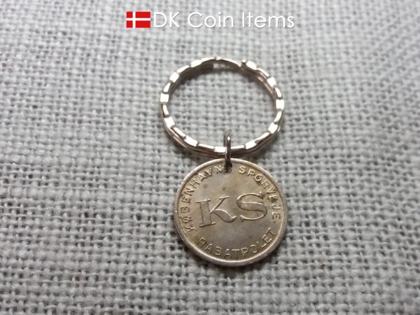 Denmark Little Mermaid coin keychain. Copenhagen Little Mermaid fare token as pendant