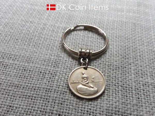 Denmark Little Mermaid coin keychain with Copenhagen Little Mermaid fare token.