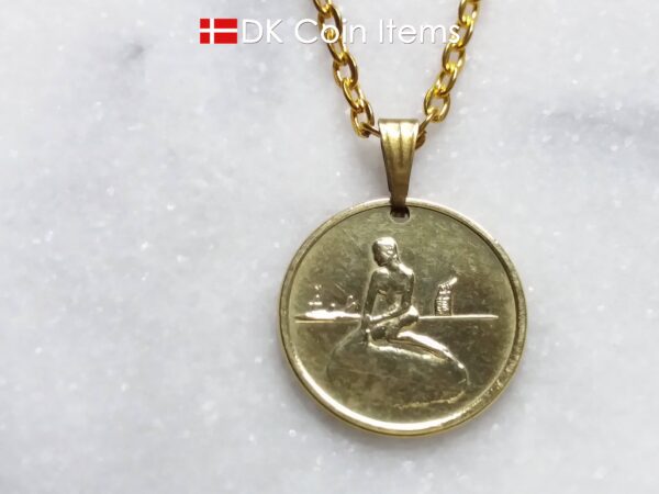 Denmark Little Mermaid coin necklace. Copenhagen Little Mermaid fare token on snap lock. Danish vintage coin souvenir.