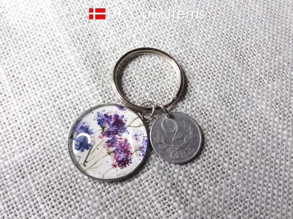 Denmark coin keychain. 2 ore C initial 1941 coin + cabochon with Wild Purple Blossoms picture.