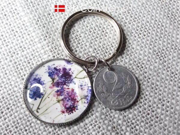 Denmark coin keychain. 2 ore C initial 1941 coin + cabochon with Wild Purple Blossoms picture.