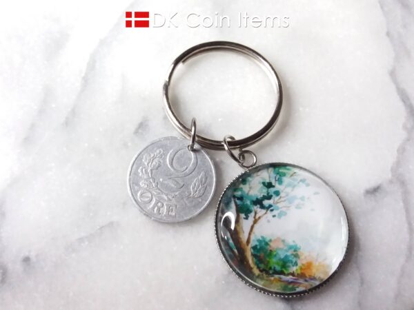 Denmark coin keychain. 2 ore C initial 1941 coin + cabochon with Tree on a hill picture.