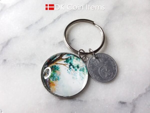 Denmark coin keychain. 2 ore C initial 1941 coin + cabochon with Tree on a hill picture.