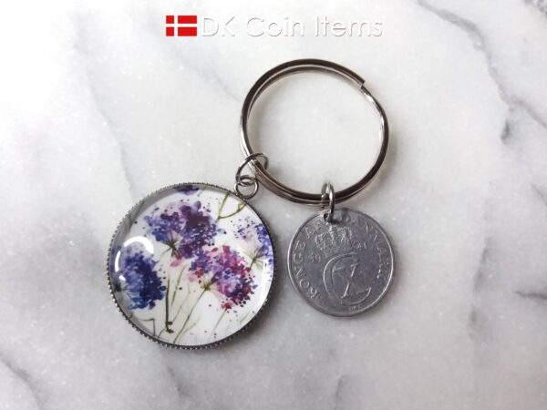 Denmark coin keychain. 2 ore C initial 1941 coin + cabochon with Wild Purple Blossoms picture.