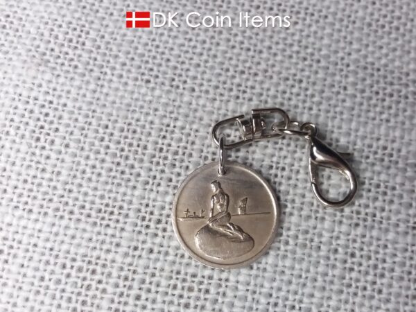 Little Mermaid charm with The Danish Little Mermaid sculpture on a Copenhagen vintage token coin