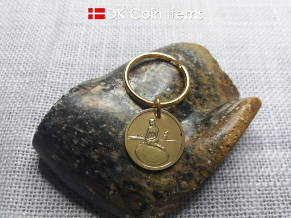 Denmark coin keychain with The Little Mermaid on a vintage fare token coin from Copenhagen