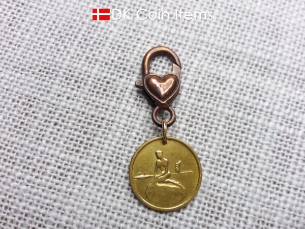 The Little Mermaid sculpture on a vintage Copenhagen token coin from Denmark 1966-1967