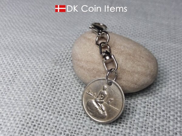 Little Mermaid charm with The Danish Little Mermaid sculpture on a Copenhagen vintage token coin