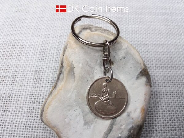 Denmark Little Mermaid coin keychain with Copenhagen fare token from the 1960s