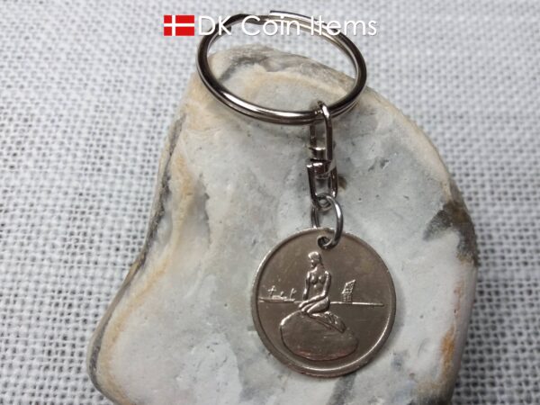 Denmark Little Mermaid coin keychain with Copenhagen fare token from the 1960s