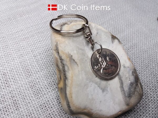 Denmark Little Mermaid coin keychain with Copenhagen fare token from the 1960s