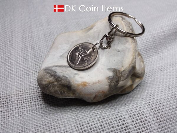 Denmark Little Mermaid coin keychain with Copenhagen fare token from the 1960s