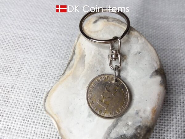 Denmark Little Mermaid coin keychain with Copenhagen fare token from the 1960s