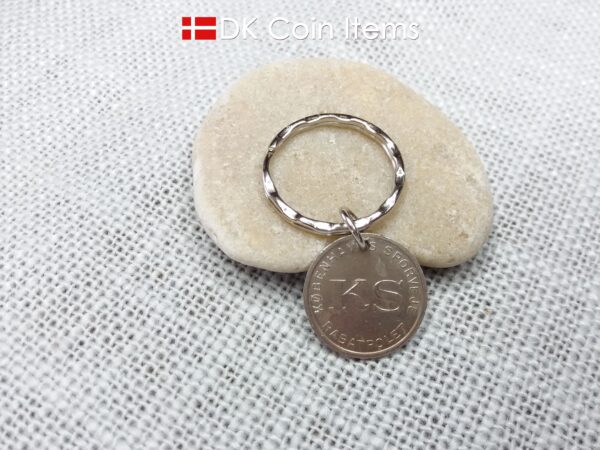 Mermaid token coin keychain. The Danish Little Mermaid on a vintage token coin from Copenhagen