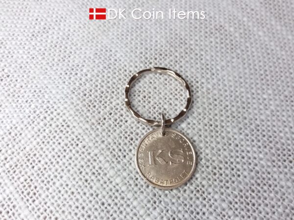 Mermaid token coin keychain. The Danish Little Mermaid on a vintage token coin from Copenhagen