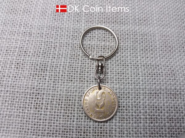 Denmark Little Mermaid coin keychain with Copenhagen fare token from the 1960s