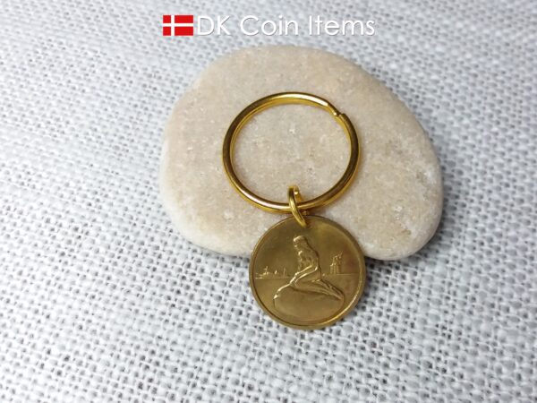 Coin pendant keychain with The Danish Little Mermaid statue/sculpture on a Copenhagen vintage brass fare token from 1966-1967