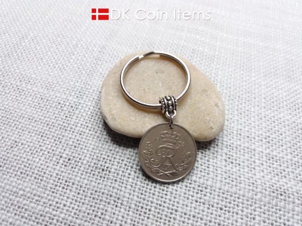 Denmark 1953 coin keychain. 71 year old Danish 25 ore with Crown R initial as coin pendant