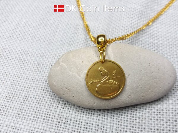 Danish coin pendant necklace with The Little Mermaid statue/sculpture on a Copenhagen vintage brass fare token from 1966-1967