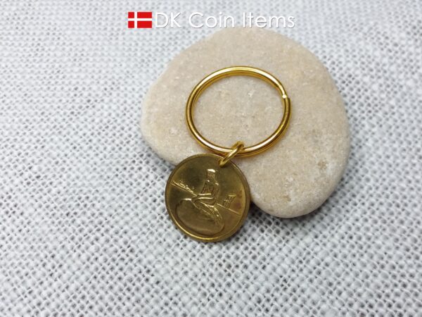 Coin pendant keychain with The Danish Little Mermaid statue/sculpture on a Copenhagen vintage brass fare token from 1966-1967