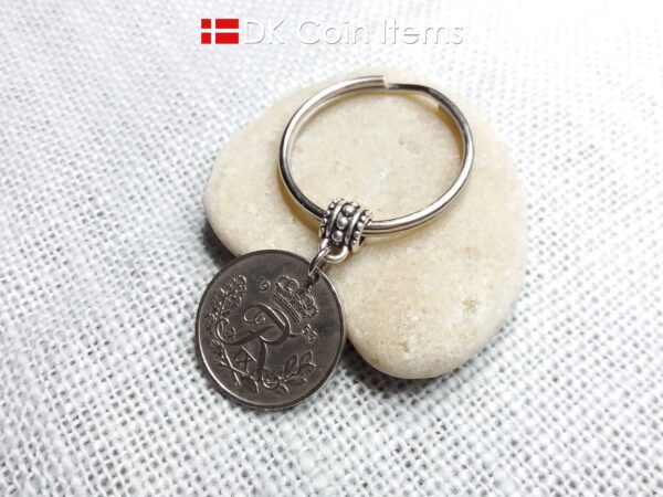 Denmark 1953 coin keychain. 71 year old Danish 25 ore with Crown R initial as coin pendant