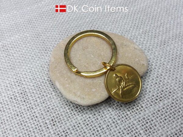 Danish coin pendant keychain with The Little Mermaid statue/sculpture on a Copenhagen vintage brass fare token from 1966-1967