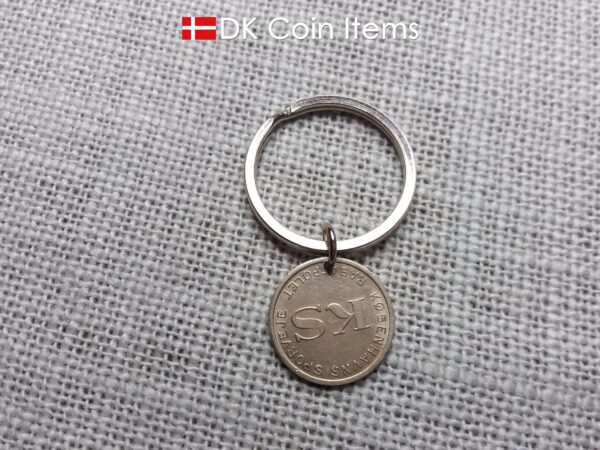 Coin pendant keychain with The Danish Little Mermaid statue/sculpture on a Copenhagen vintage fare token from 1966-1967