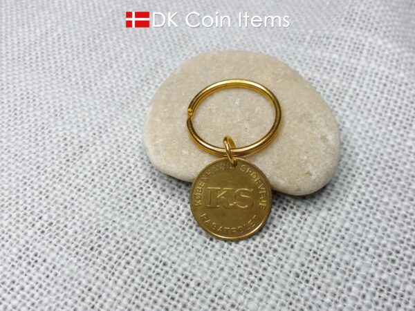 Coin pendant keychain with The Danish Little Mermaid statue/sculpture on a Copenhagen vintage brass fare token from 1966-1967