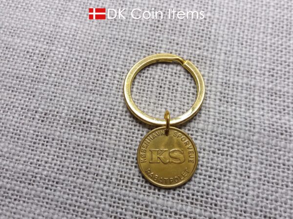 Danish coin pendant keychain with The Little Mermaid statue/sculpture on a Copenhagen vintage brass fare token from 1966-1967