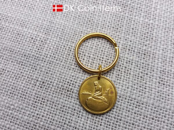 Coin pendant keychain with The Danish Little Mermaid statue/sculpture on a Copenhagen vintage brass fare token from 1966-1967