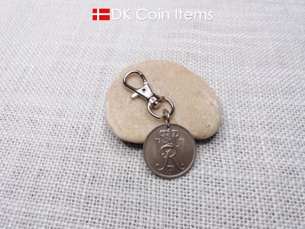 Denmark 1962 R-initial coin charm with 62 year old 25 ore as coin pendant on trigger clip with swivel base