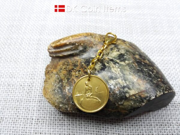 Danish Coin charm with the Little Mermaid sculpture in Copenhagen on vintage 1966-1967 fare token as pendant