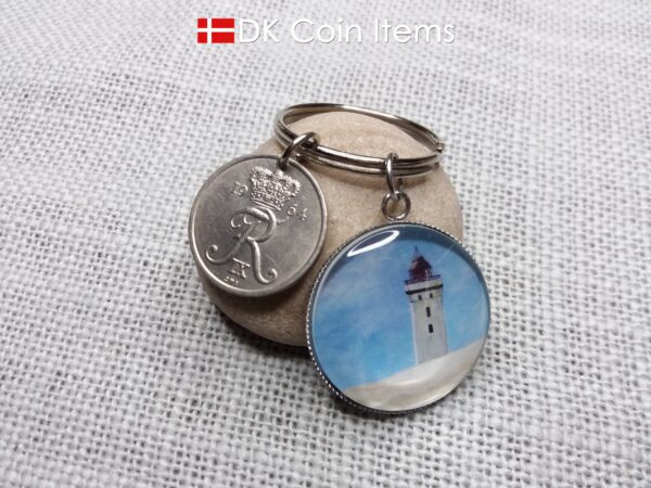 Denmark 1964 coin keychain with 55 year old Crown R 25 ore coin and Rubjerg Knude Lighthouse painting pendant. Danish vintage souvenir gift