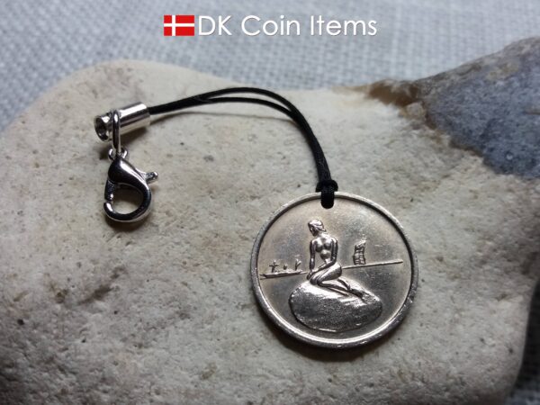 Coin charm with the Danish Little Mermaid sculpture in Copenhagen on vintage 1966-1967 fare token as pendant