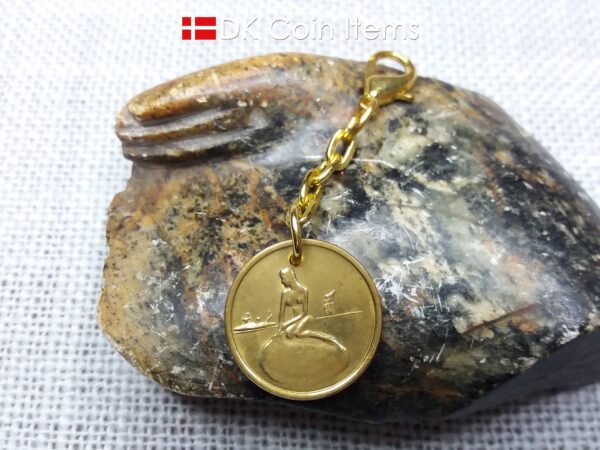 Danish Coin charm with the Little Mermaid sculpture in Copenhagen on vintage 1966-1967 fare token as pendant