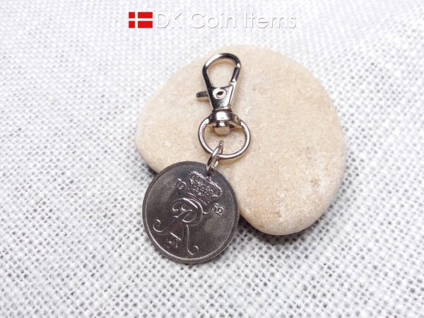 Denmark 1962 R-initial coin charm with 62 year old 25 ore as coin pendant on trigger clip with swivel base