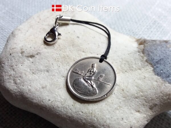 Coin charm with the Danish Little Mermaid sculpture in Copenhagen on vintage 1966-1967 fare token as pendant