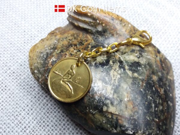 Danish Coin charm with the Little Mermaid sculpture in Copenhagen on vintage 1966-1967 fare token as pendant