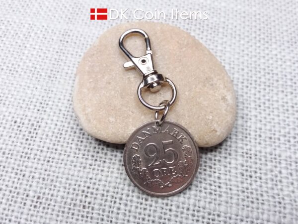 Denmark 1962 R-initial coin charm with 62 year old 25 ore as coin pendant on trigger clip with swivel base