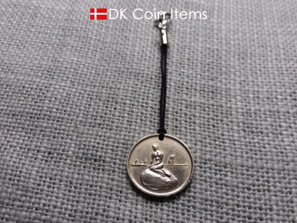 Coin charm with the Danish Little Mermaid sculpture in Copenhagen on vintage 1966-1967 fare token as pendant