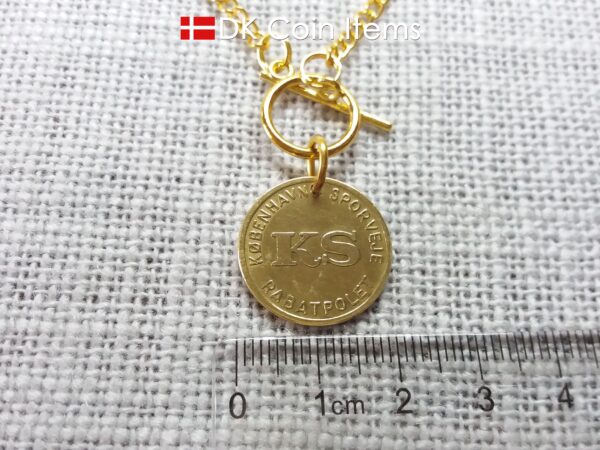 Danish coin necklace. The Little Mermaid statue Copenhagen on fare token