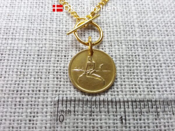 Danish coin necklace. The Little Mermaid statue Copenhagen on fare token